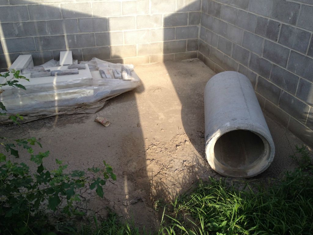 TRASH ENCLOSURE TO BE MODIFIED